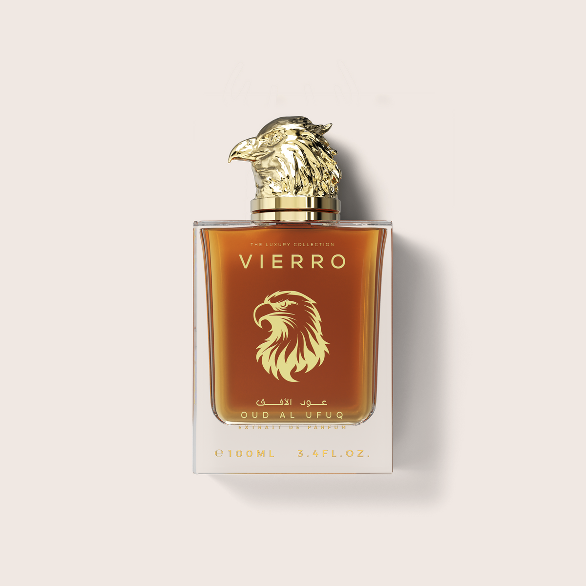 A 100ml glass bottle of Vierro Oud Al Ufuq perfume featuring a detailed gold falcon head cap and warm amber liquid inside, set against a neutral light background.